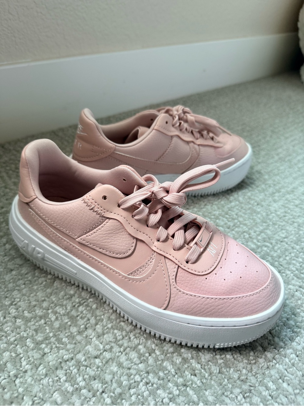 Nike Women's Low-Top Sneakers in Blush Pink and White